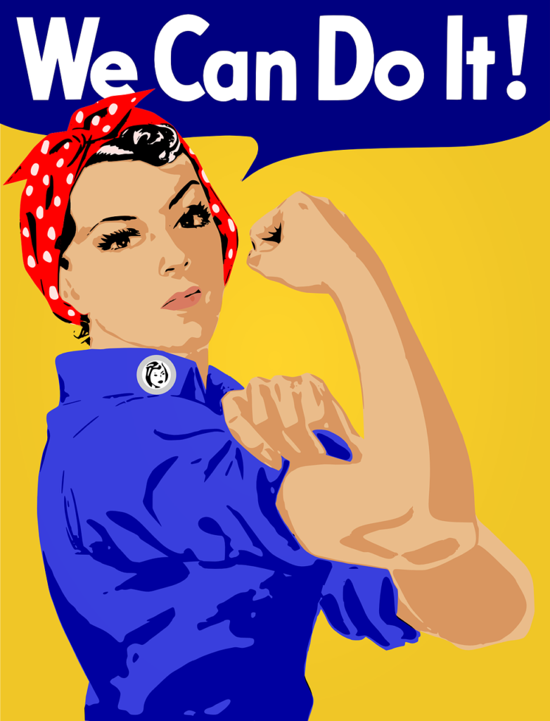 Woman in headscarf showing off biceps "we can do it"